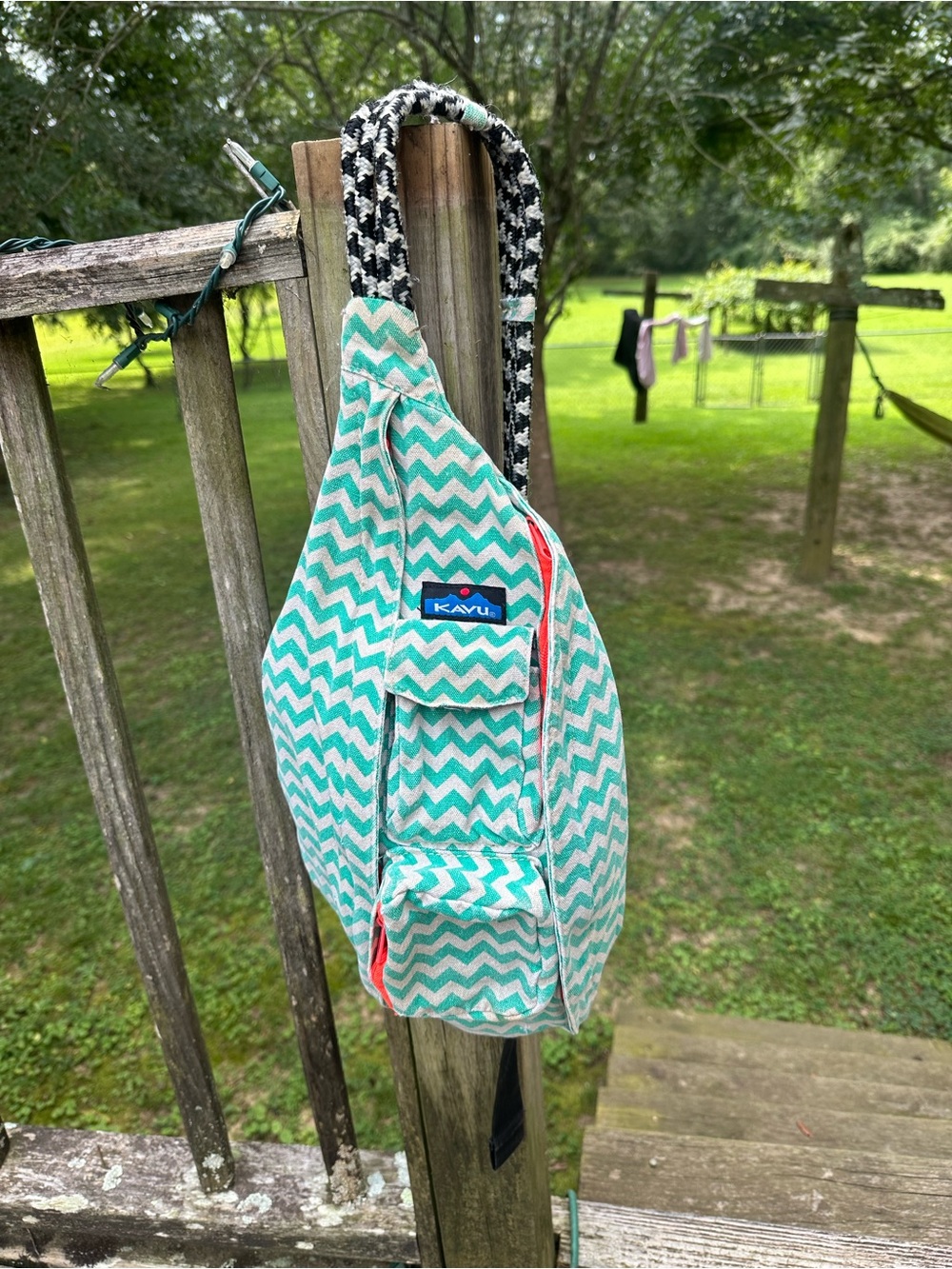 Kavu Chevron Sling Bag in Teal and White with Black Rope Strap